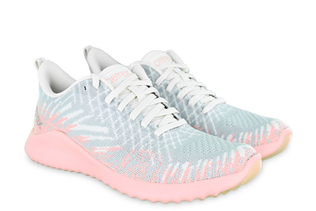 Becks Shoes - A women's Emery running shoe in light blue and pink.