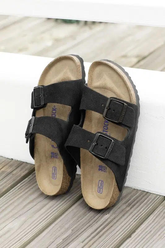 Birkenstock Arizona Black Suede Sandals - Classic two-strap design with adjustable buckles, featuring a soft suede upper and contoured cork footbed for ultimate comfort.